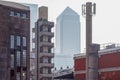 Skyscrapers in Canary Wharf seen through old industry buildings