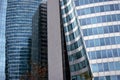 Paris, France. La Defense business district, August 2018. Skyscrapers closeup. Steel, glass and reflections with colours.