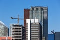 Skyscrapers with construction of a new office building Royalty Free Stock Photo