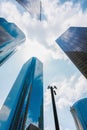 Skyscrapers in the downtown city of Los Angeles, CA. Business District. Low-angle view of tall modern buildings with a cloudy sky