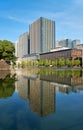 Skyscrapers of Marunouchi district reflecting in the water of Edo castle outer moat. Tokyo. Japan