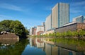 Skyscrapers of Marunouchi district reflecting in the water of Edo castle outer moat. Tokyo. Japan Royalty Free Stock Photo