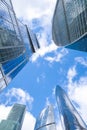 Skyscrapers modern architecture office building with clouds in blue sky, high tech style of Royalty Free Stock Photo