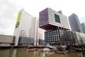 skyscrapers, old boats and business people around the water of Wijnhaven in the center of Rotterdam