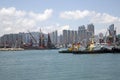 Group skyscrapers and pier in city Hongkong China Royalty Free Stock Photo