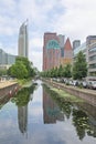 Skyscrapers  reflecting in the water of a canal in The Hague Royalty Free Stock Photo