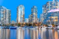 Skyscrapers reflection along False Creek riverside in Vancouver BC at blue hour Royalty Free Stock Photo