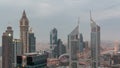 Skyscrapers on Sheikh Zayed Road and DIFC day to night in Dubai, UAE. Royalty Free Stock Photo