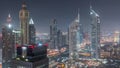 Skyscrapers on Sheikh Zayed Road and DIFC day to night in Dubai, UAE. Royalty Free Stock Photo