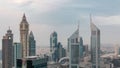Skyscrapers on Sheikh Zayed Road and DIFC day to night timelapse in Dubai, UAE. Royalty Free Stock Photo