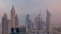 Skyscrapers on Sheikh Zayed Road and DIFC morning timelapse in Dubai, UAE. Royalty Free Stock Photo