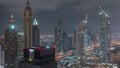 Skyscrapers on Sheikh Zayed Road and DIFC night timelapse in Dubai, UAE. Royalty Free Stock Photo