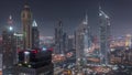Skyscrapers on Sheikh Zayed Road and DIFC night timelapse in Dubai, UAE. Royalty Free Stock Photo