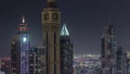 Skyscrapers on Sheikh Zayed Road and DIFC night timelapse in Dubai, UAE. Royalty Free Stock Photo