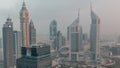 Skyscrapers on Sheikh Zayed Road and DIFC night to day timelapse in Dubai, UAE. Royalty Free Stock Photo