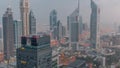 Skyscrapers on Sheikh Zayed Road and DIFC night to day timelapse in Dubai, UAE. Royalty Free Stock Photo