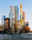 Skyscrapers standing proud under a clear bright sky in the city of Frankfurt at sunset