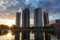 Skyscrapers in sunset at Putrajaya, Malaysia. Building reflecting in the lake Royalty Free Stock Photo