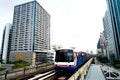 skytrain over the traffic in the city centre in the city of Bangkok, rush hour travel Solve traffic jams Royalty Free Stock Photo