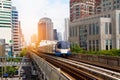 Skytrain Station Train sky trainon railroad in city downtown with sunlight Royalty Free Stock Photo