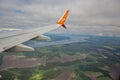 SkyUp Airlines aircraft wing flying over Dnieper River