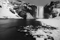SkÃÂ³gafoss waterfall Iceland in winter, black and white Royalty Free Stock Photo
