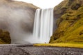 Skogafoss waterfall under Myrdalsjokull glacier Royalty Free Stock Photo