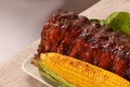 Slab of barbeque ribs and corn Royalty Free Stock Photo