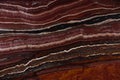 Slab natural Onyx stone red with beautiful stripes, called Onice Fantastico Royalty Free Stock Photo