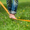 Slack line in the city park. Royalty Free Stock Photo