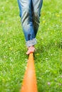 Slack line in the city park. Royalty Free Stock Photo