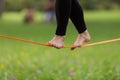 Slack line in the city park.