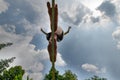 Slackline. a barefoot boy walking on a webbing in balance Royalty Free Stock Photo