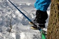 Slackline is a sport, leisure activity, entertainment, or training aid. Everyone trains balance when balancing on a loosely stretc Royalty Free Stock Photo