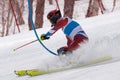 Mountain skier skiing down mount. Russian Alpine Skiing Championship, slalom