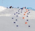 Slalom slope with colorful orange and blue gates