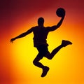 Silhouette of basketball player in motion, action isolated on gradient yellow orange background in neon light. Sport