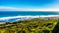 Slangkop Lighthouse on the Atlantic coast along the road to Chapman`s Peak in the Cape Peninsula