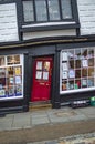 The slanted house of red door in canterbury