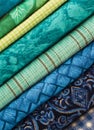 Slanted Stack of Blue and Green Fabrics