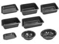 Slanted view different types of black trays isolated on white background - black plastic trays - trays food - rectanguler trays