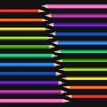 Slanting Line of Realistic Colorful Pencils on Black Background.