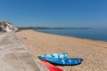 Slapton Sands beach Devon England UK, from Torcross in direction of Dartmouth with canoes Royalty Free Stock Photo