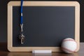Slate with baseball; chalk and whistle Royalty Free Stock Photo