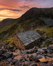 Slate Mountain Hut/Bothy With Beautiful Sunset In Lake District. Royalty Free Stock Photo