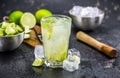 Fresh made Caipirinha on a slate slab close-up shot; selective focus