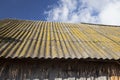 Slate tiled roof of old grunge wooden shed Royalty Free Stock Photo