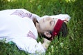 Slav girl at green meadow. Royalty Free Stock Photo