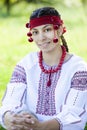 Slav girl at green meadow. Royalty Free Stock Photo