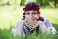 Slav girl at green meadow. Royalty Free Stock Photo